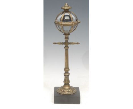 A 19th century Continental novelty crystal ball desk fancy, as a Victorian lamp-post, the glass ball enclosed in a fluted hin