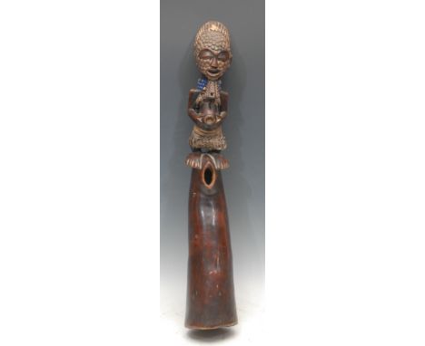 Tribal Art - a Luba figural oliphant, adorned with beadwork, 67cm long, Democratic Republic of Congo