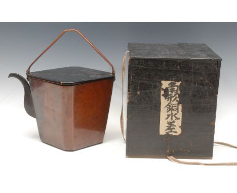 A Japanese patinated bronze canted square kettle, swing handle, two-piece lacquer cover, 19.5cm high, Meiji period, pine reta