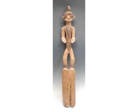 Tribal Art - an Igbo Mmo Society figure, of slender proportions, decorated in earth pigments, 77cm high, Nigeria