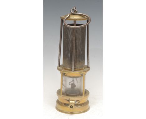 A 19th century Davy type brass miner's lamp, inscribed J Mills, Newcastle, domed top, protecting gauze within four columns ab