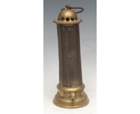 A 19th century Davy type brass miner's lamp, inscribed J Mills, Newcastle, domed pierced top, protecting gauze within four co
