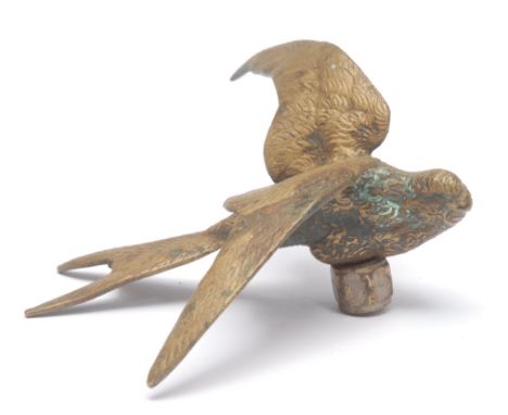 Automobilia - an early 20th century Austin 7 Swallow car mascot, 12cm long, c.1930