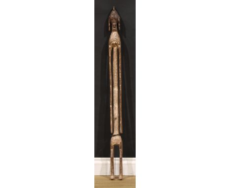 Tribal Art - a Mumuye tutelary figure, of slender and narrow proportions, highly stylised features, traces of white pigment, 