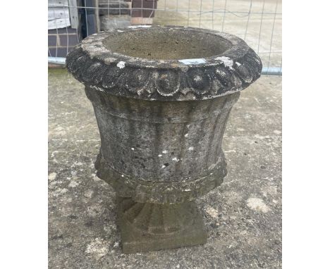 Old stone pedestal planter 