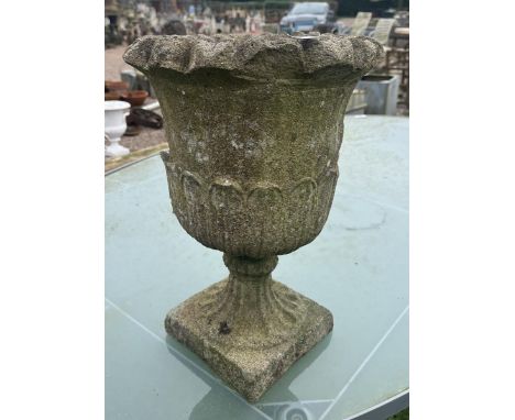 Small stone pedestal planter 