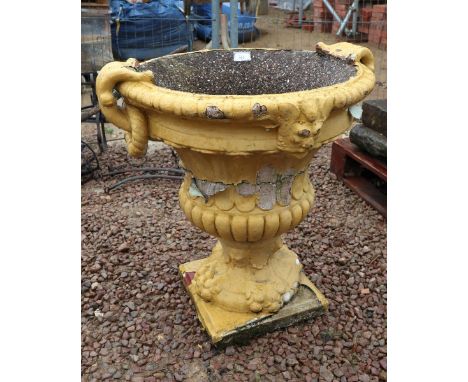 Large stone pedestal planter in yellow 