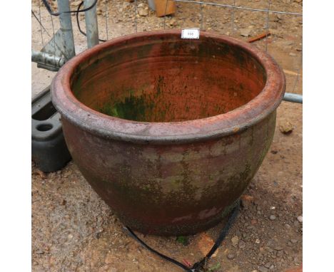 Large circular terracotta planter 