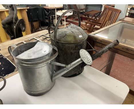 2 vintage watering cans