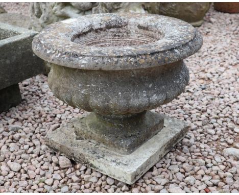 Small stone pedestal planter 