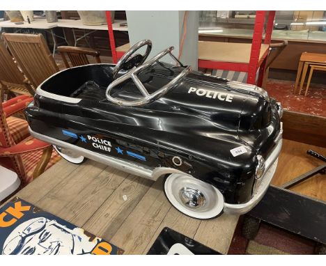 Vintage children’s pedal police car
