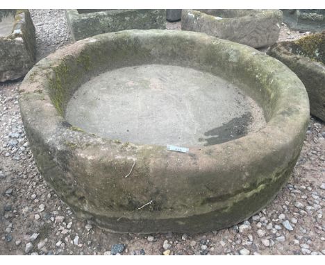 Large antique circular stone trough 