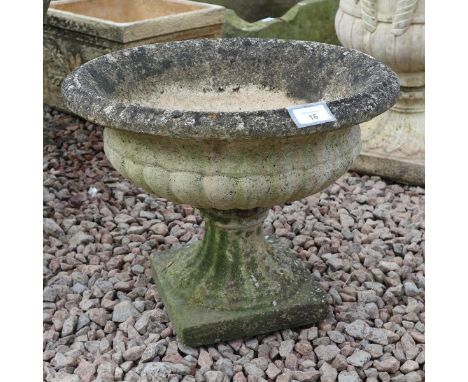 Small stone pedestal planter 