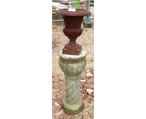 Small cast iron pedestal planter on stone base 