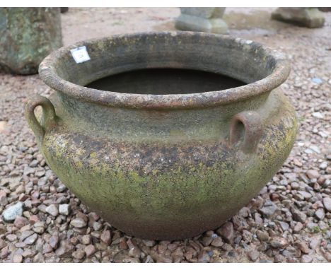 Circular terracotta planter 