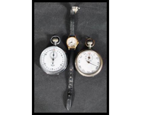 A vintage Tag Heuer stop watch pocket watch along with another swiss made example and a vintage Timex watch. Please see image