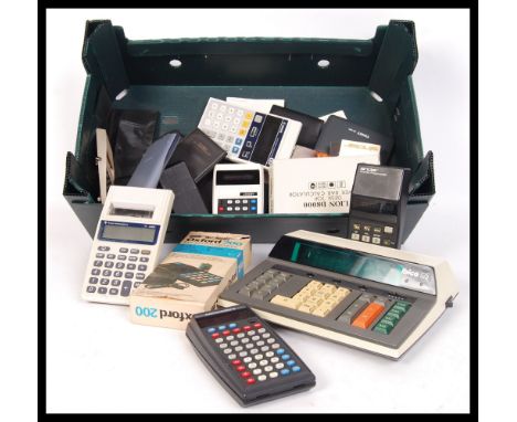 A large collection of vintage 20th Century desktop / pocket and scientific calculator and personal organisers to include a bo