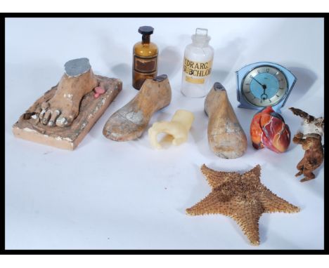 A mixed lot of medical related items to include a 19th century Apothecary poison glass bottle with stopper , medical models ,