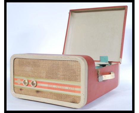 A fabulous mid Century two tone four speed portable record player by Phillips, speaker and dials to front with carry handle t
