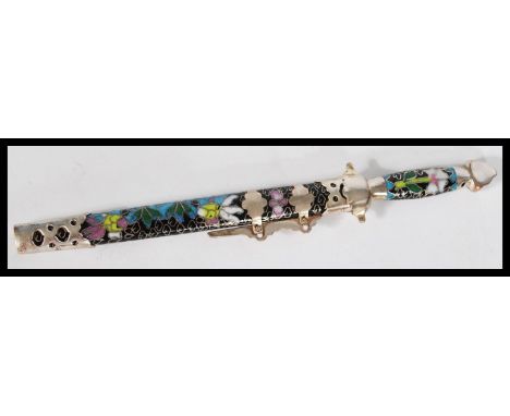 A vintage early 20th century Cloisonne Chinese paper knife letter opener having a black ground with enamel flowers and silver