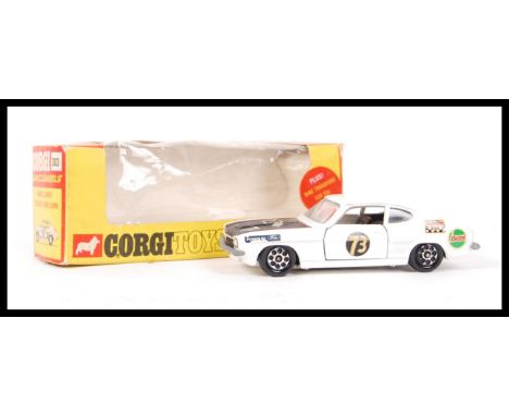 An original boxed vintage Corgi Toys diecast " Whizzwheels " series model. Roger Clark's 3 Litre V.6. Ford Capri with the whi