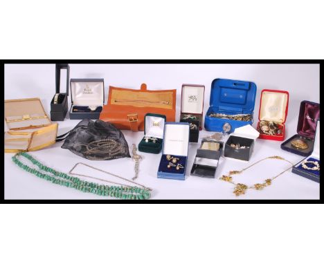 A good collection of vintage costume jewellery to include silver bar brooch, earrings, an Ingersol marcasite cocktail watch, 