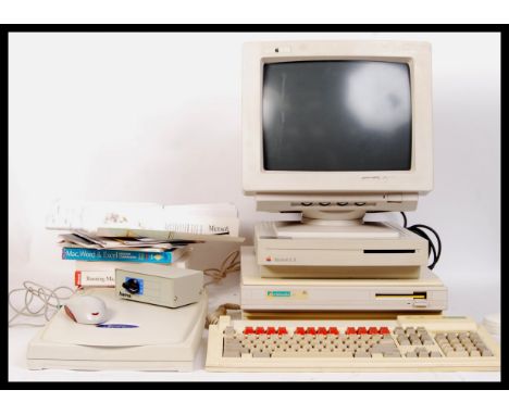 A collection of vintage computer hardware components vastly Macintosh lC 2 and Archimedes with a Mustek scanner to also inclu