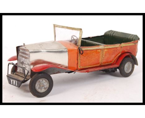 An early&nbsp;to mid&nbsp;20th Century vintage South African made tinplate classic car / automobile having rubber wheels. Mad