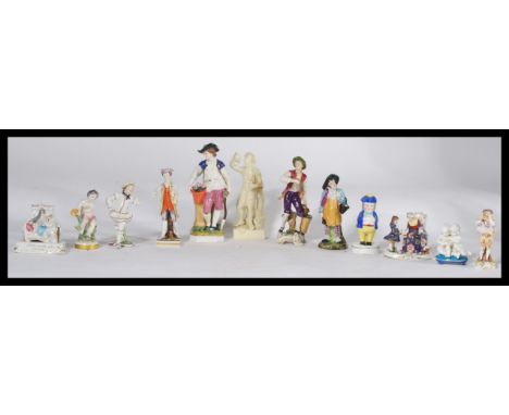 A collection of ceramic figures dating from the 18th century to include a Meissen figural group of two cherubs with a basket 