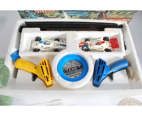 An original vintage Scalextric Grand Prix 8 model motor racing. Appears to be complete in the original box with the two Shado