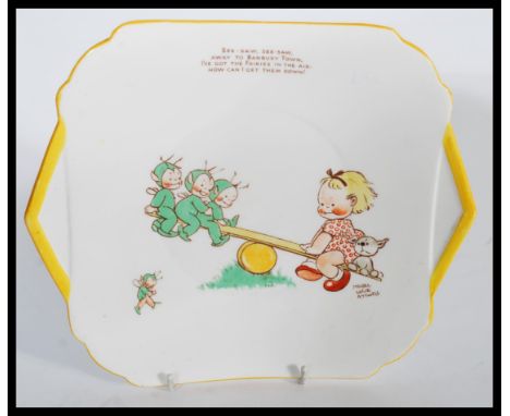 An early 20th century Art Deco ceramic Shelley Mabel Lucie Attwell plate depicting a girl and dog on see saw with three Boo B