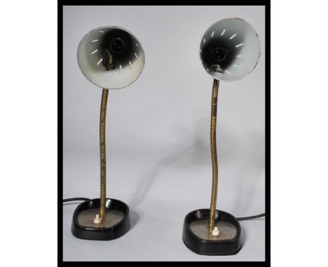 A pair of vintage mid 20th Century Pifco goose-neck desk / bedside lamps, ebonised fitted conical shades, the base with fitte