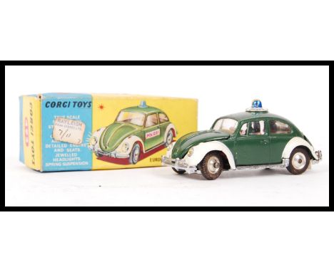 An original boxed vintage Corgi Toys diecast model no. 492 " Volkswagen European Police Car " having the green and white colo