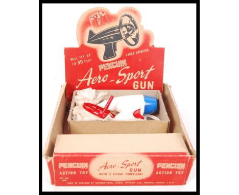 An original vintage advertising point of sale shop display card box for Penguin Action Toy Aero-Sport guns together with an e