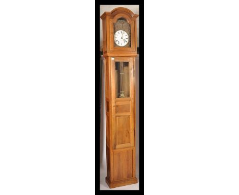 A 19th century French fruitwood longcase / comptoise grandfather clock. The white enamel dial signed for&nbsp; the maker havi