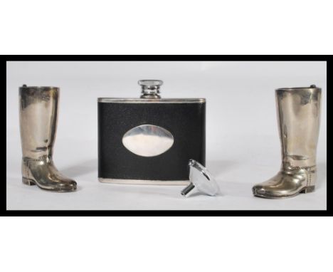 A pair of vintage mid Century silver plated drinking measures modelled as a pair of horse riding boots together with a hip fl