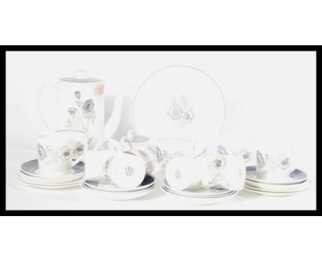 A 20th century Wedgwood Glen Mist Susie Cooper pattern tea service comprising cups, saucers, plates etc. Stamped to the base.