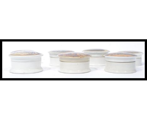 A group of seven 19th century Victorian ceramic Prattware pictorial pot lids and bases to include A Pair , Pegwell Bay Establ