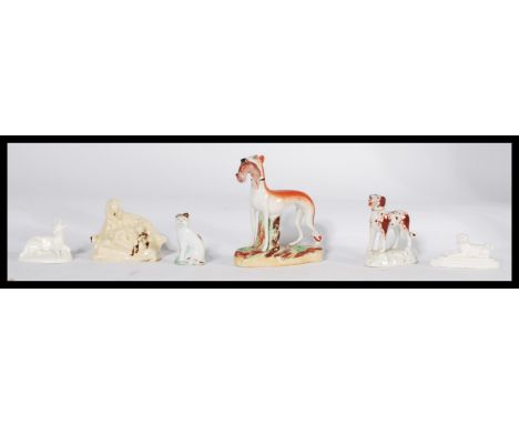 A group of Staffordshire ceramic figures of animals dating from the 18th century to include Canary yellow sheep and lamb havi
