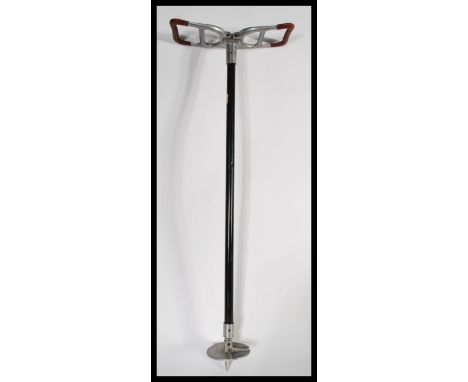 A leather topped vintage 20th Century shooting stick with makers marks for The&nbsp; Featherwaite. Measures 87 cm high.