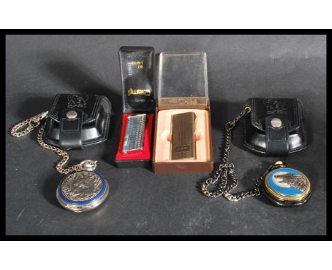 Two Franklin Mint Collectors pocket watches, with fob chains and leather belt pouches, each watch set with Wolves together wi
