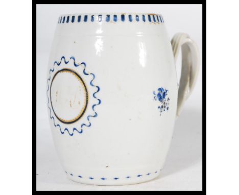 A late 18th century Chinese export porcelain small barrel shape mug tankard, with double, overlapping strap handle and moulde