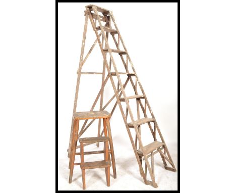 An early 20th century wooden trellis - lattice worked Industrial step ladder. Ideal as conversion to bookcase / display shelf