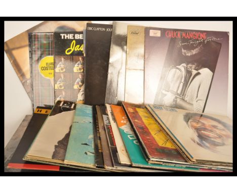 Vinyl records - A collection of vinyl long play LP records predominately from the 1980's featuring several artists to include