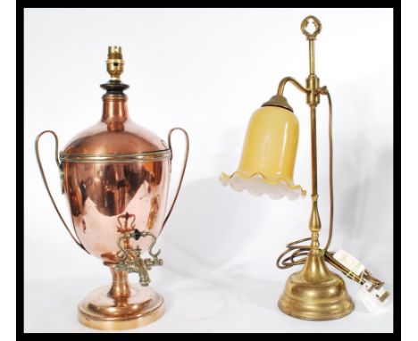 A 19th century Regency copper samovar converted to a table lamp along with a vintage brass adjustable table lamp with glass s