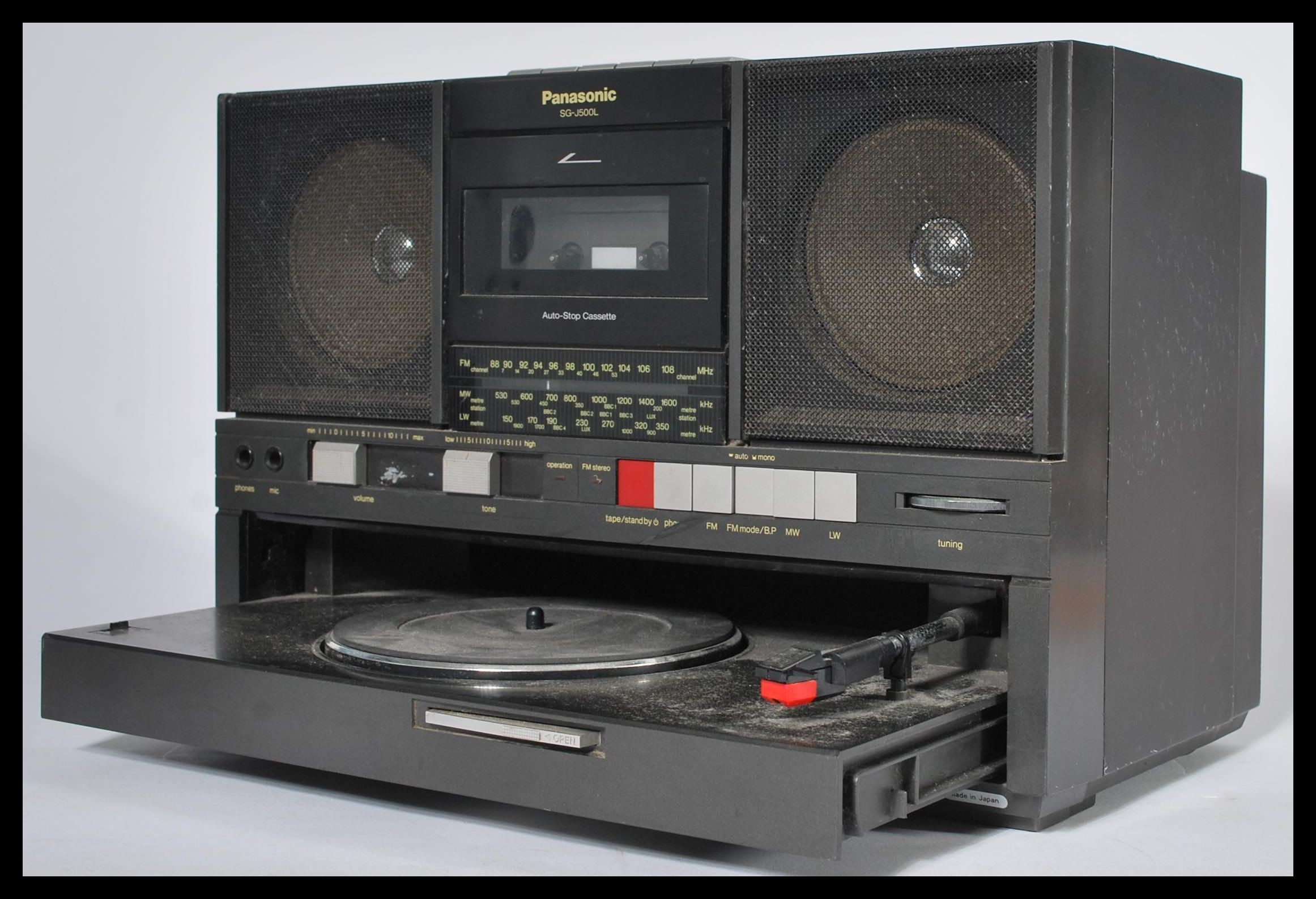 A retro 20th Century Panasonic portable record player, tape player and