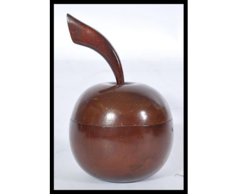 An early 20th century Edwardian tea caddy in the form of an apple with elongated stem and leaf. Please see images.