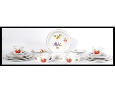 A Royal Worcester Evesham pattern part dinner / tea service comprising cups, saucers, plates, bowls etc being stamped to the 
