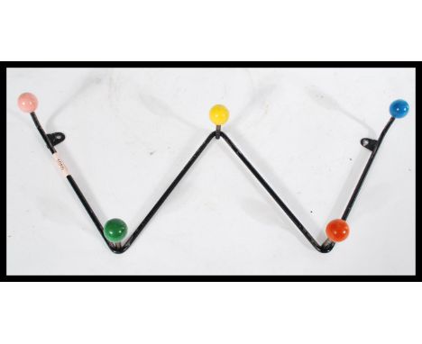 A set of vintage retro 20th century Sputnik Atomic coat hooks of zigzag form having a painted finish with coloured ball finia