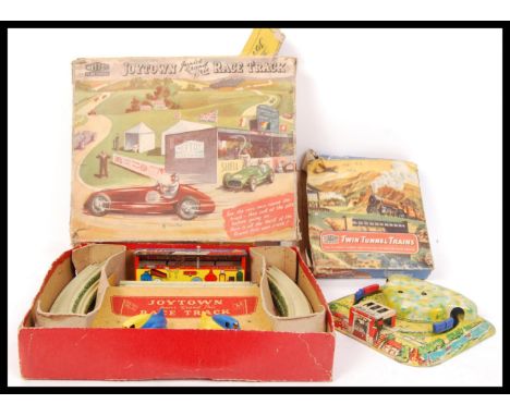 A retro vintage tinplate Joytown Junior Grand Prix Race Track by Mettoy Playthings complete in it's original box together wit